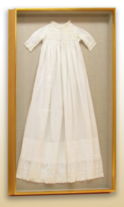 Frame your family's christening gowns