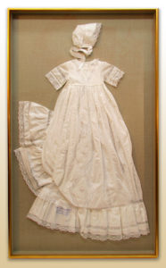 Frame your family's christening gowns