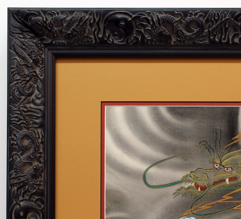 Could this dragon-themed picture frame be any more perfect?