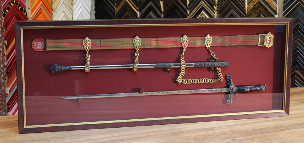 officer's sword in a shadowbox